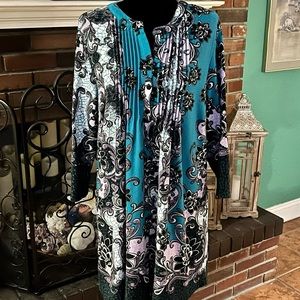 Mini dress with pockets, goes great with leggings.